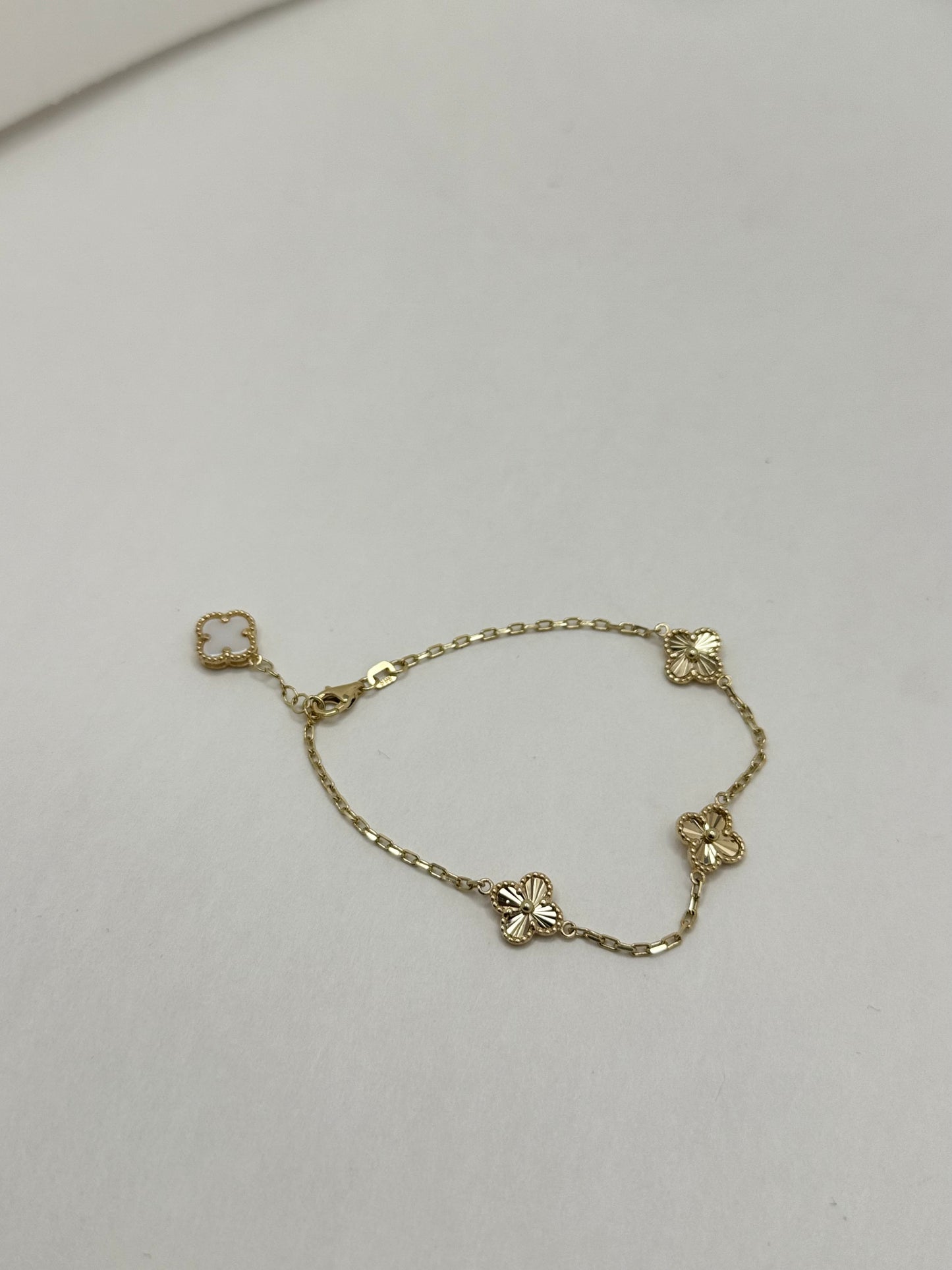 16-inch 14K gold clover chain and a matching 8-inch bracelet
