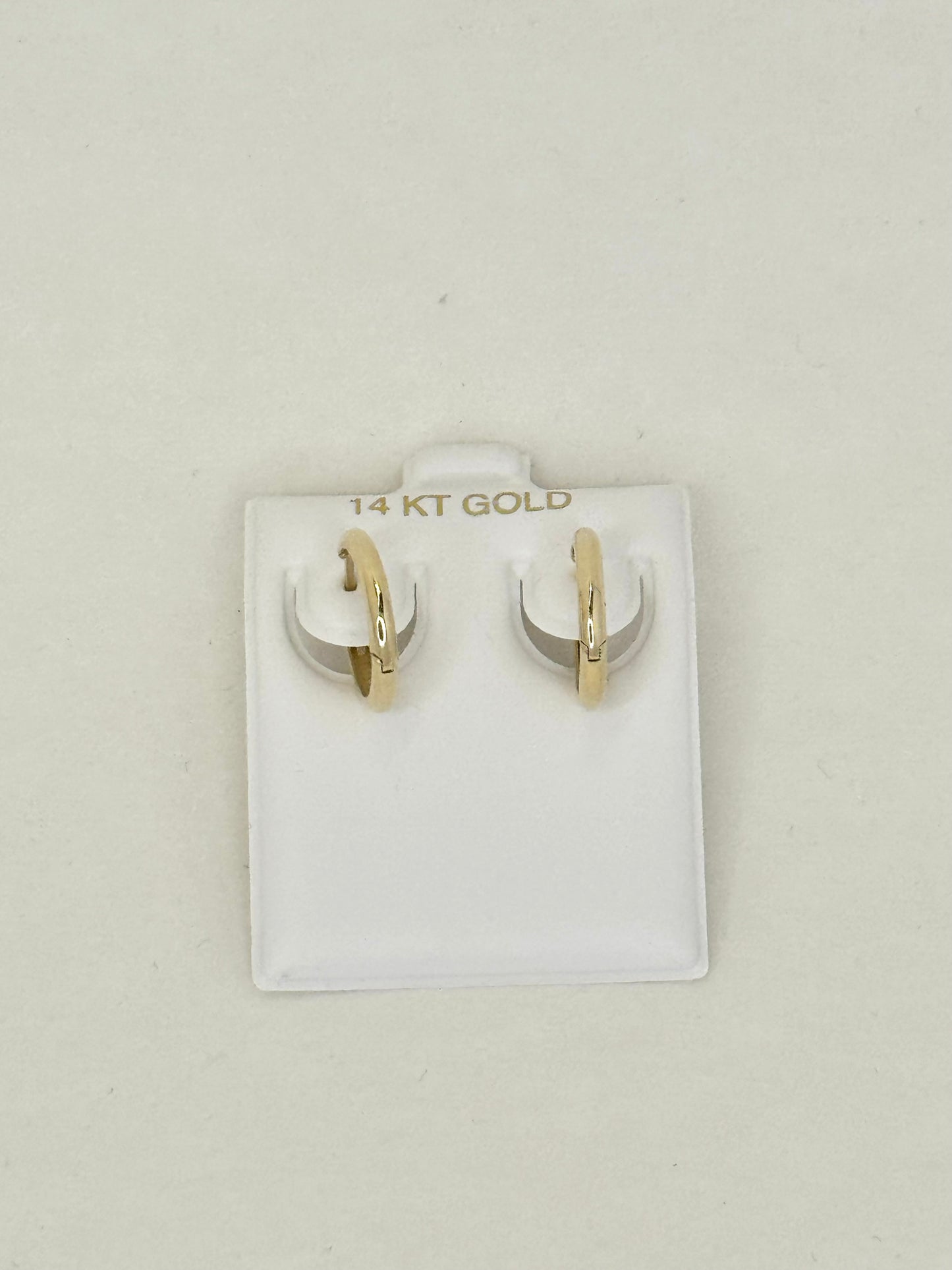 14k gold Huggie round earring