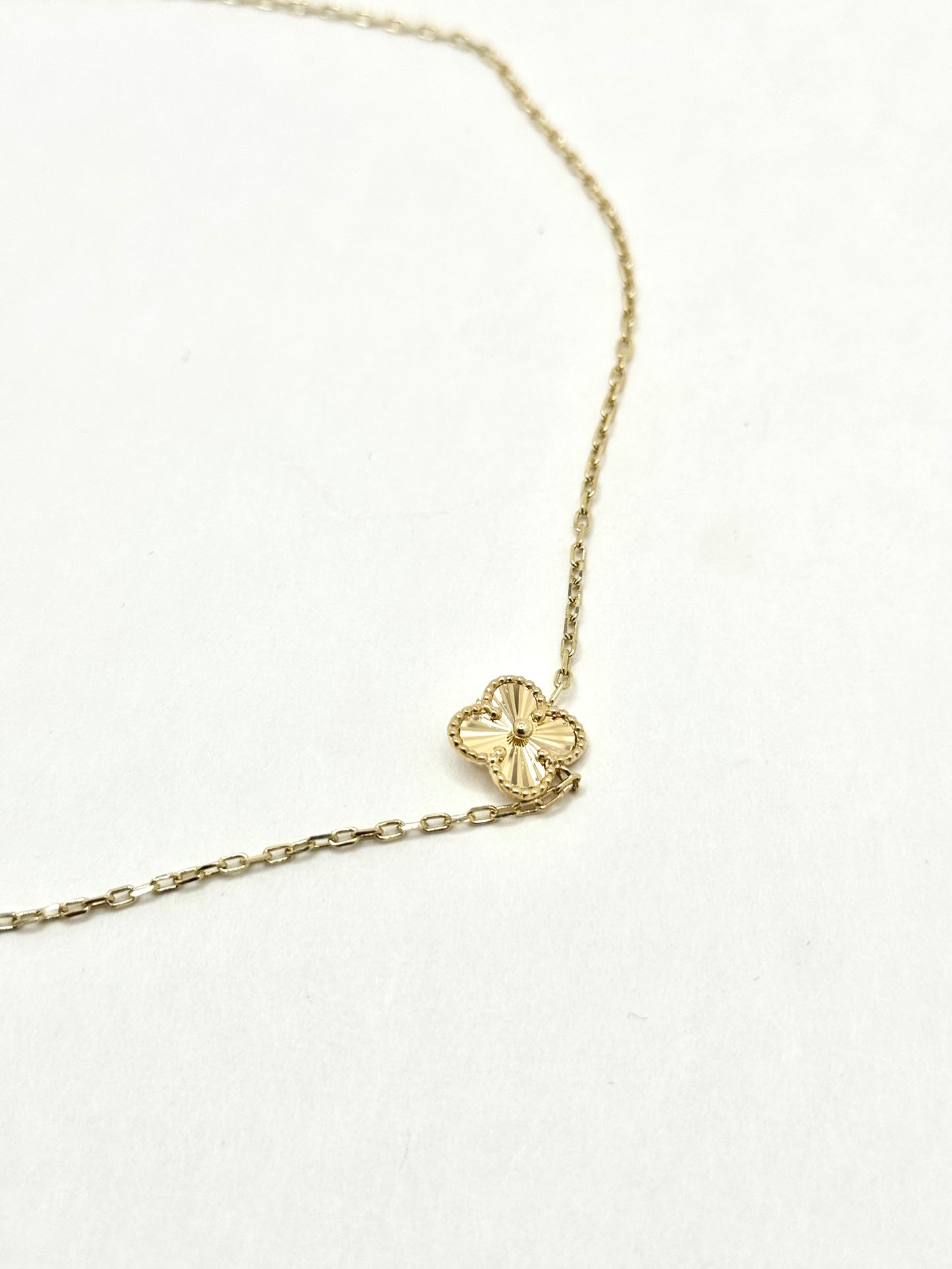 16-inch 14K gold clover chain and a matching 8-inch bracelet