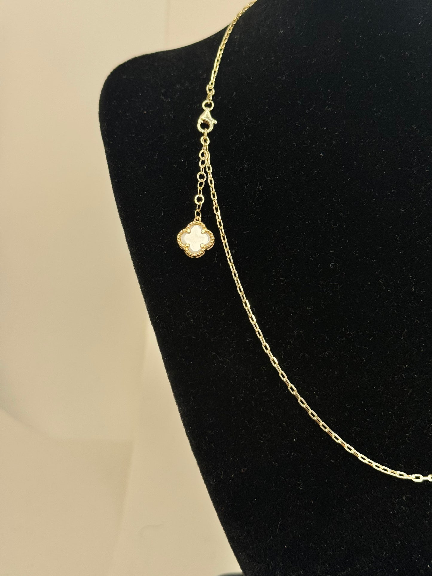 16-inch 14K gold clover chain and a matching 8-inch bracelet