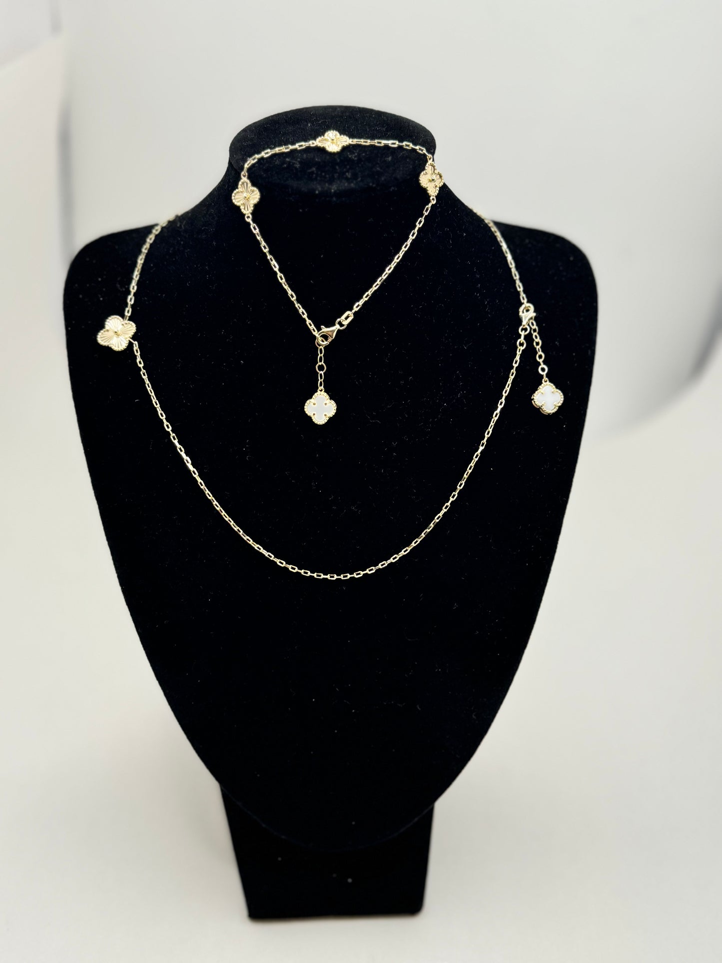 16-inch 14K gold clover chain and a matching 8-inch bracelet