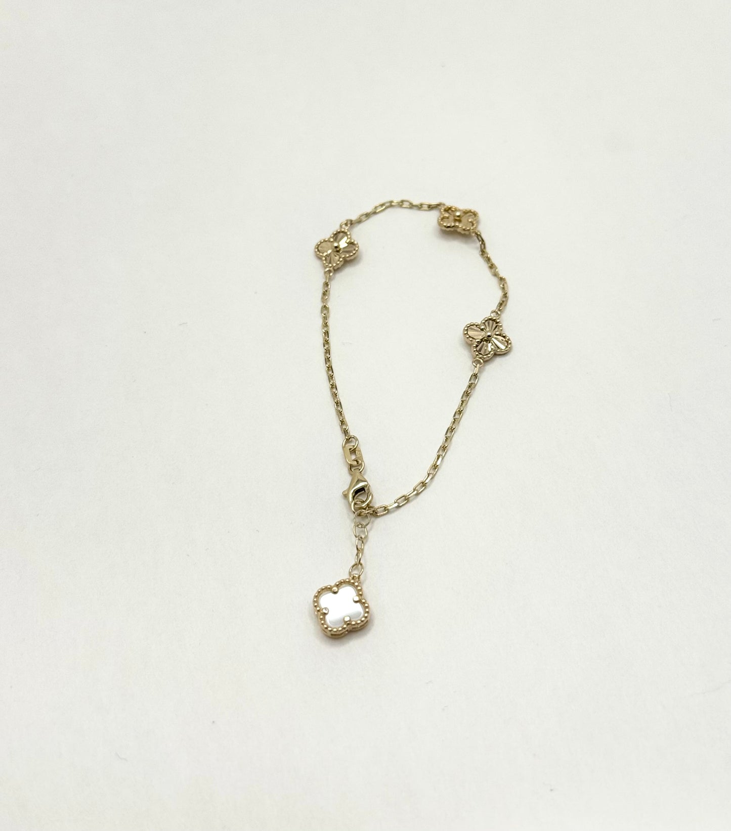 16-inch 14K gold clover chain and a matching 8-inch bracelet