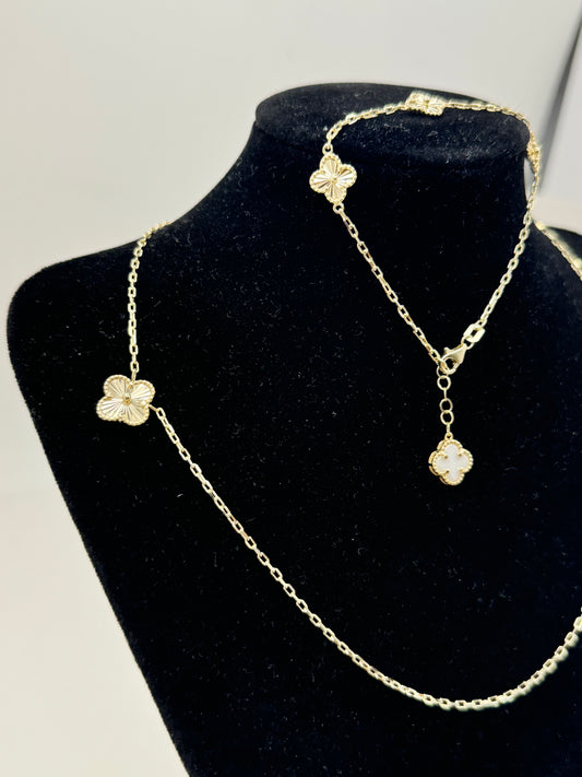16-inch 14K gold clover chain and a matching 8-inch bracelet