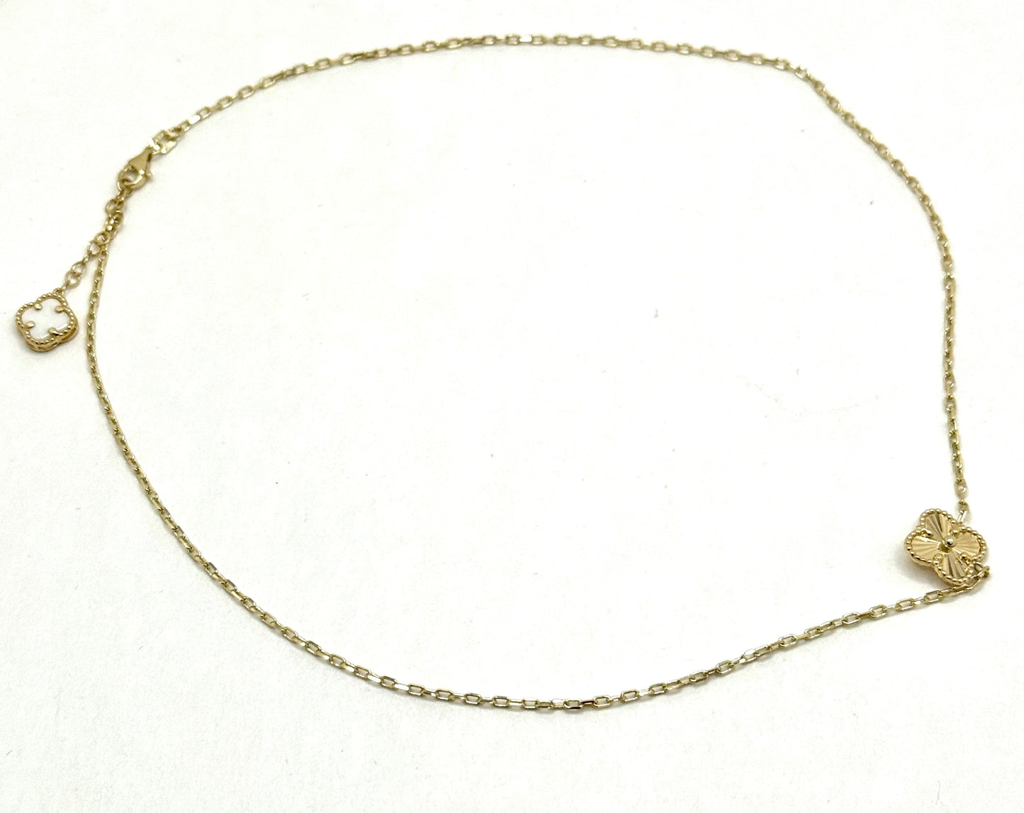 16-inch 14K gold clover chain and a matching 8-inch bracelet