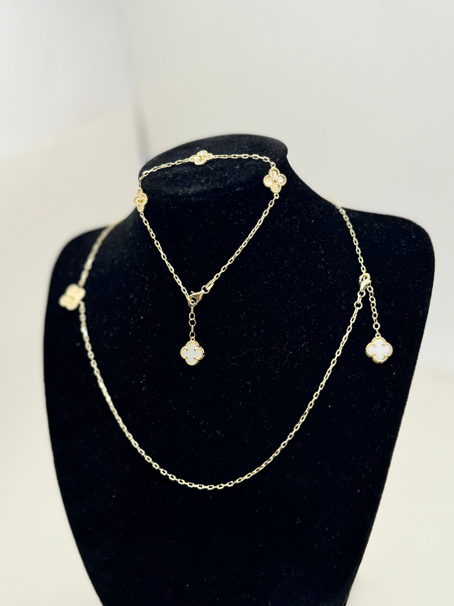 16-inch 14K gold clover chain and a matching 8-inch bracelet
