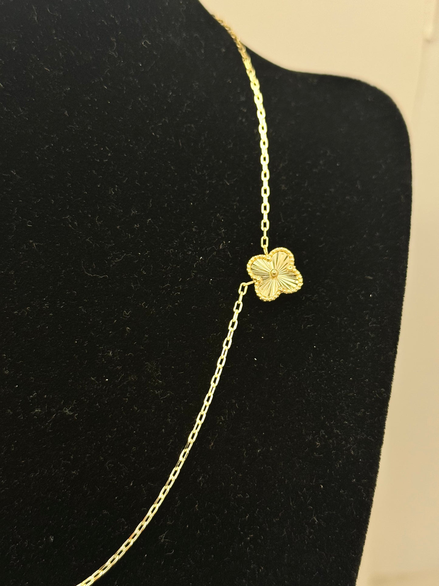 16-inch 14K gold clover chain and a matching 8-inch bracelet