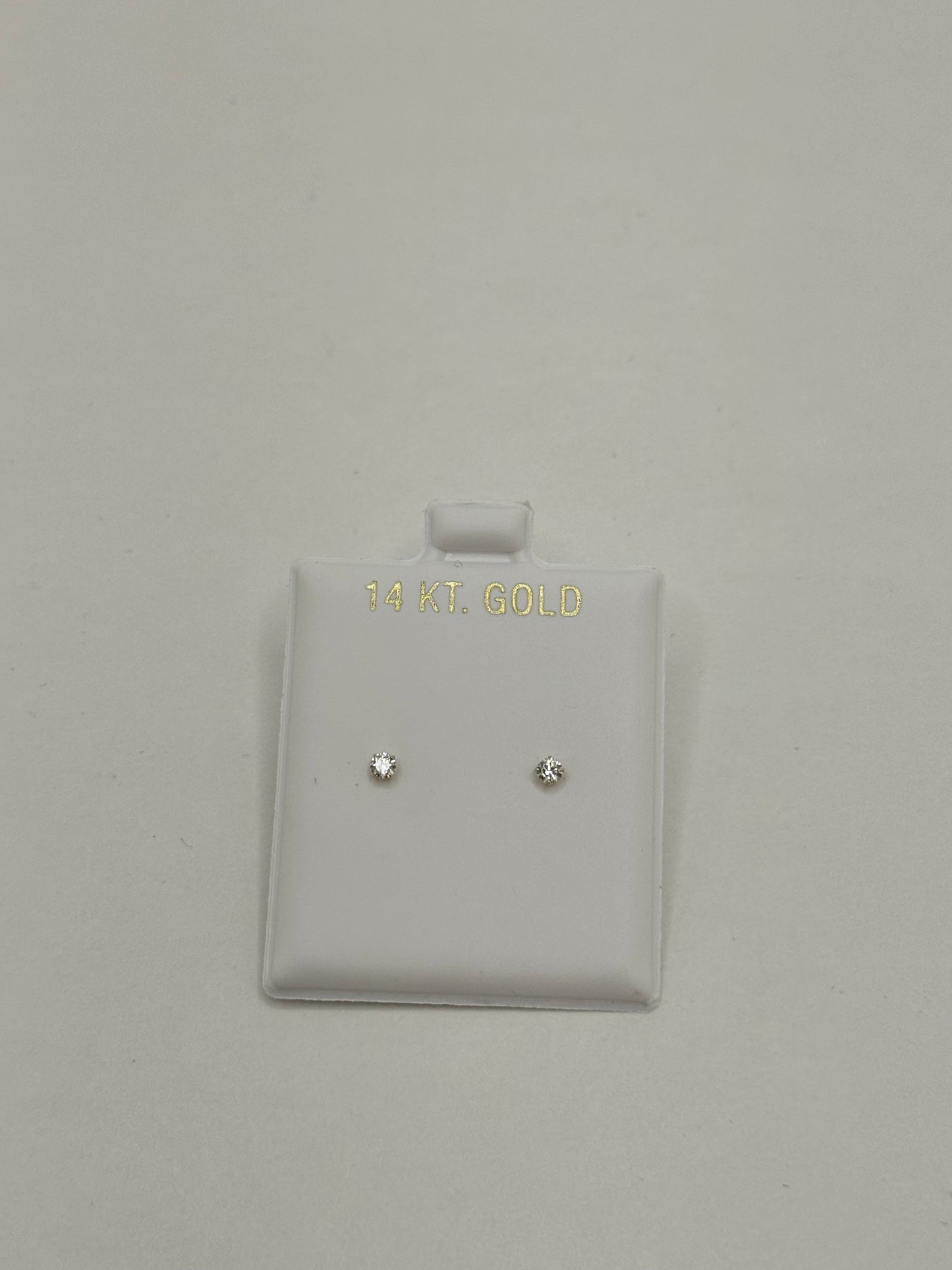 14k Gold stud earring with cubic zirconia  unisex