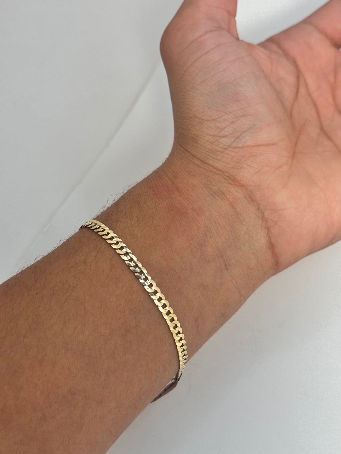 14k gold Cuban link bracelet, single tone yellow Gold