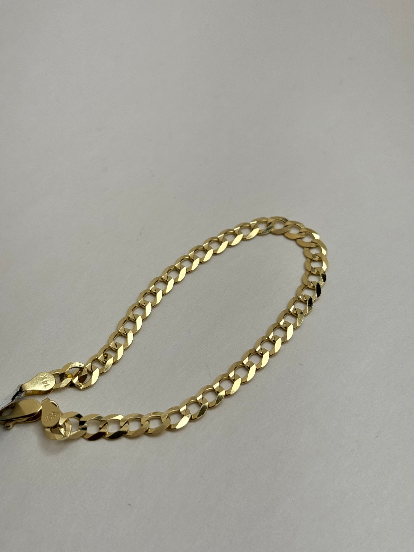 14k gold Cuban link bracelet, single tone yellow Gold